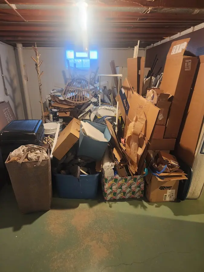 Roll-off dumpster container at job site for Concrete Dumpster Rental in Franklin